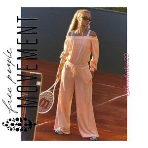 FP MOVEMENT BY FREE PEOPLE One to Beat Onesie Pastel Peach Large NWOT